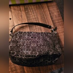 COACH  BLACK AND SILVER PURSE..